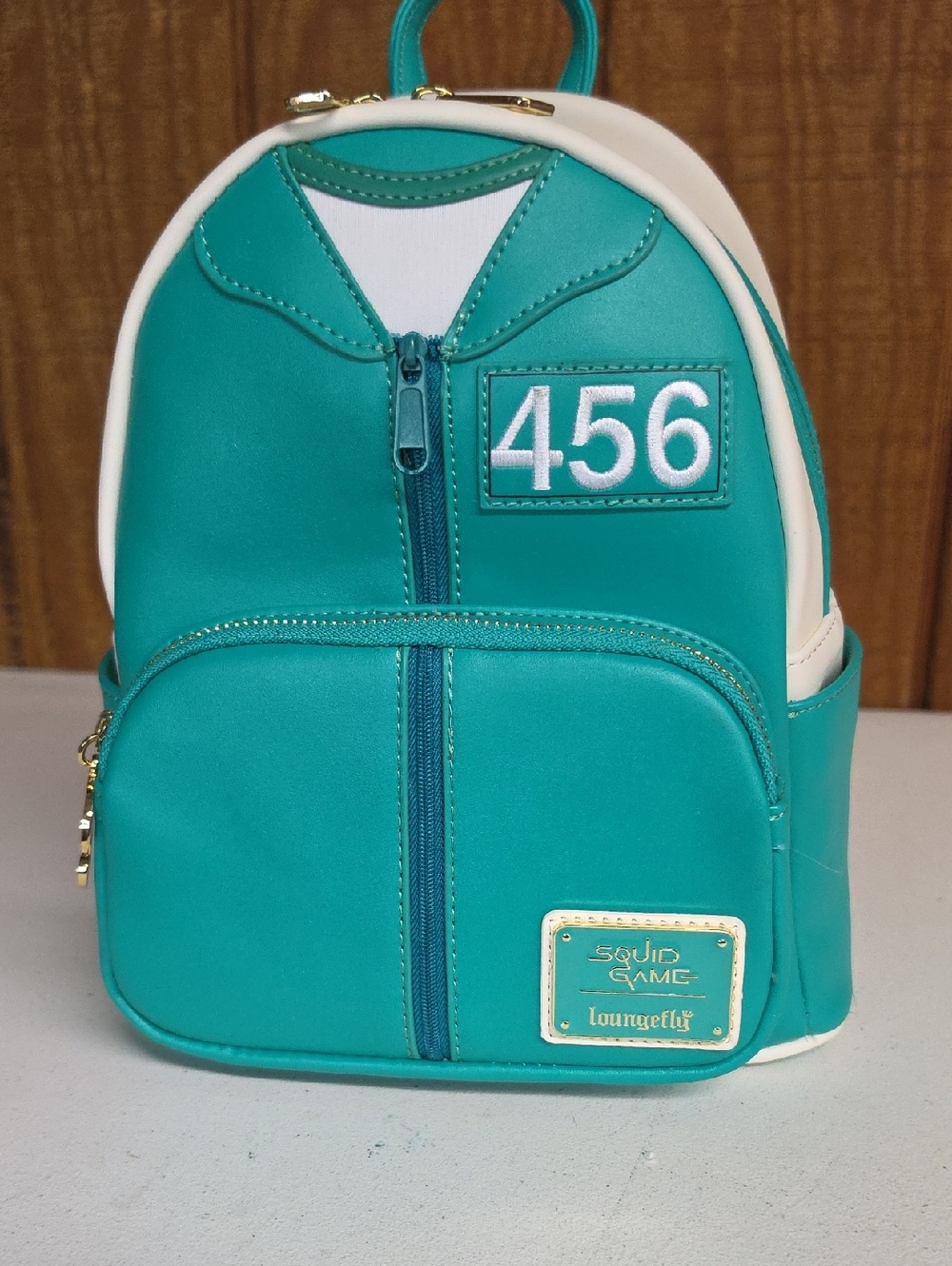 Loungefly Teal and White '456' Mini Backpack